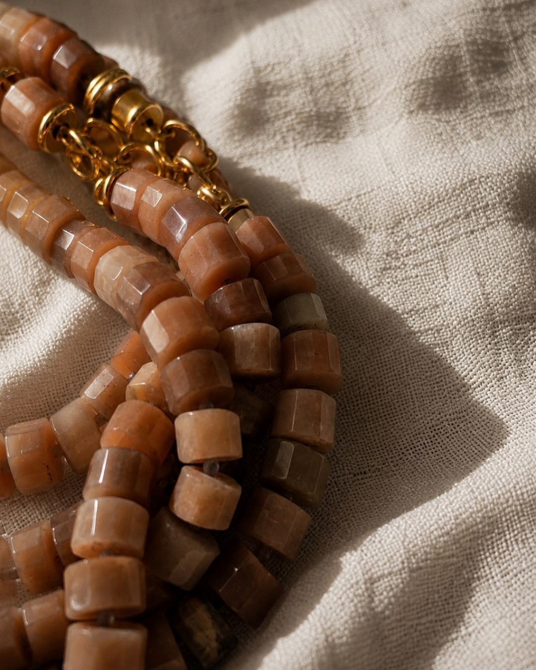 Statement collar necklaces crafted from natural gemstones and refined details, designed to be worn alone or layered with intention.