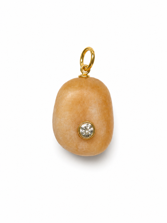 Lumen Relic No. 02 a tumbled honey calcite with a moissanite