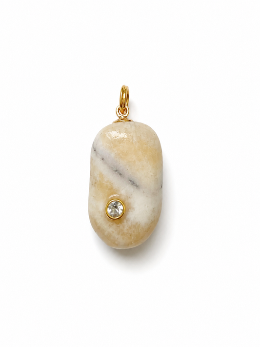 Lumen Relic No. 01, a tumbled yellow calcite with a moissanite